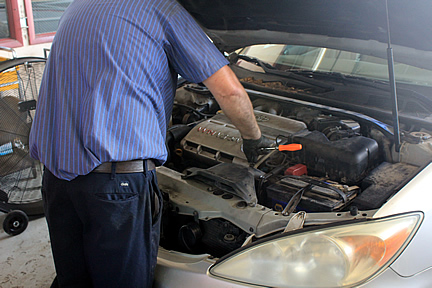 auto repair, transmission, clutch repair, air conditioning service, brakes, tires, exhaust systems